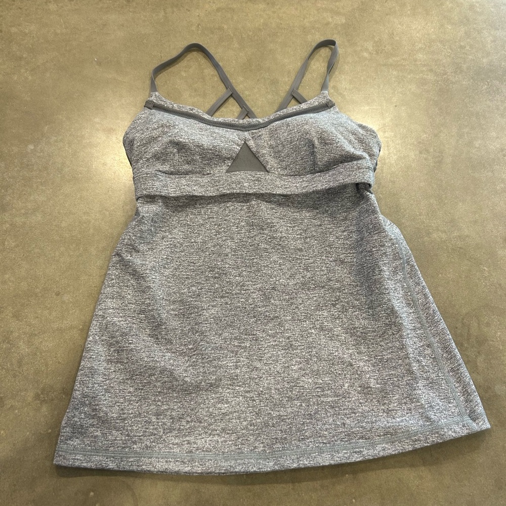 Lululemon woman’s gray tank with strappy back detail. Size 8